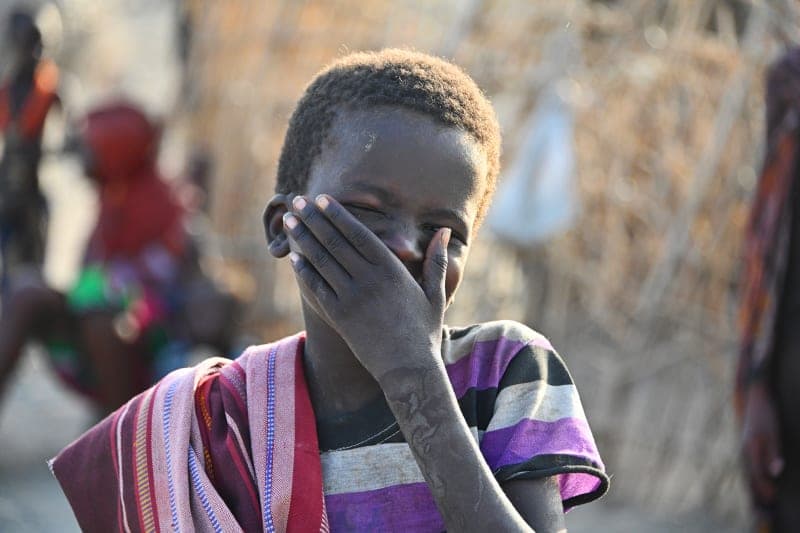 Young child laughing, Lake Nakuru